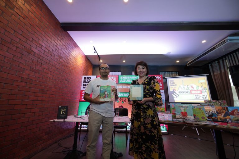 Big Bad Wolf - Jacqueline Ng with Harvey Maraguinot of Gawad Kalinga